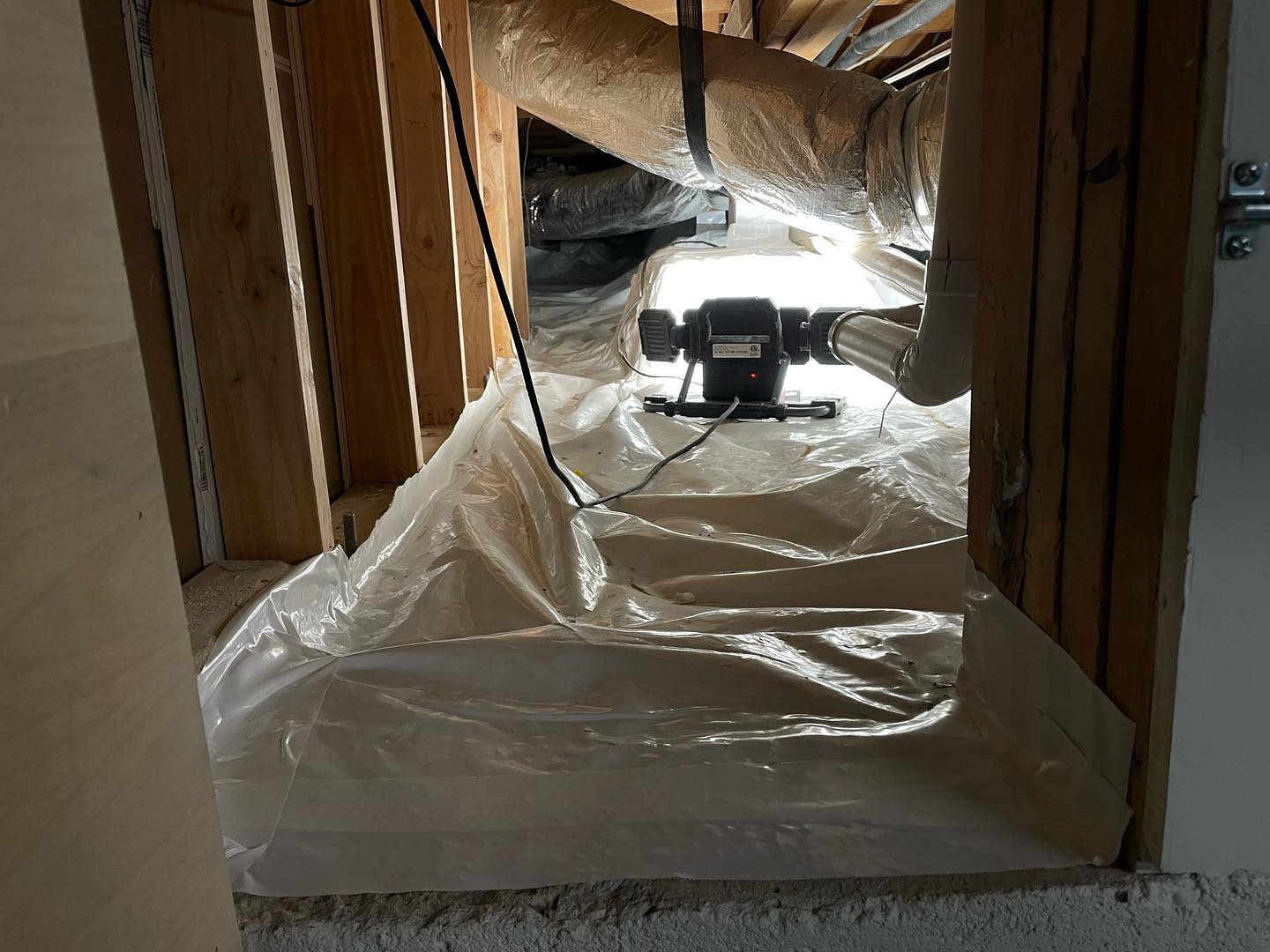 Crawlspace Encapsulation with Vapor Barrier and Ductwork

